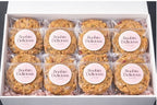 Triple Pack - Goji White Chocolate cookies in a gift box, labeled Boobin Delicious, showcasing individually wrapped treats.