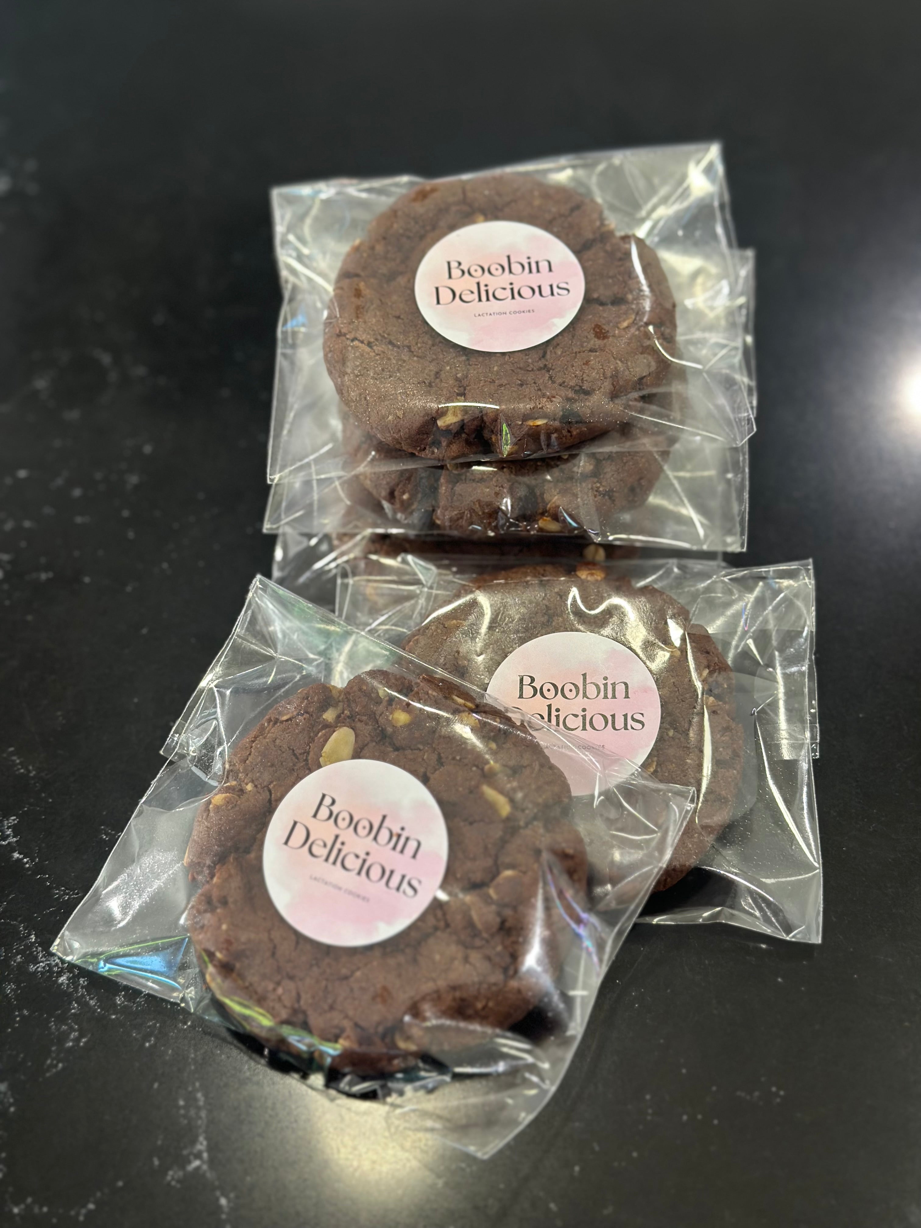Chocolate Brownie Vegan Lactation Cookies in wrappers