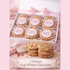 Triple Pack - Goji White Chocolate cookies in a gift box with a pink ribbon, featuring individually wrapped treats.